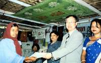 certificates after completion of course- South Korean Ambassador giving certificate at Nashikataha center March 14, 2004.